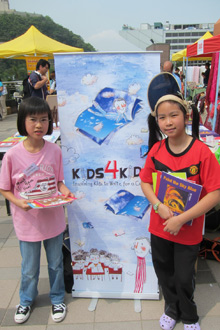 Our students running a book selling event at the Peak with Kids4Kids